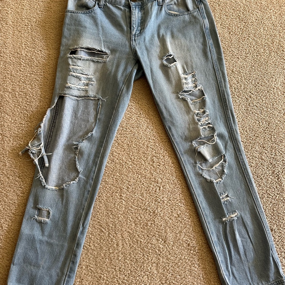 Distressed Light Blue Jeans